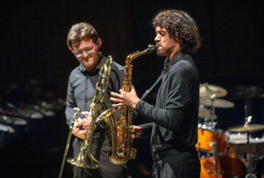 A saxophone player and a trombone player